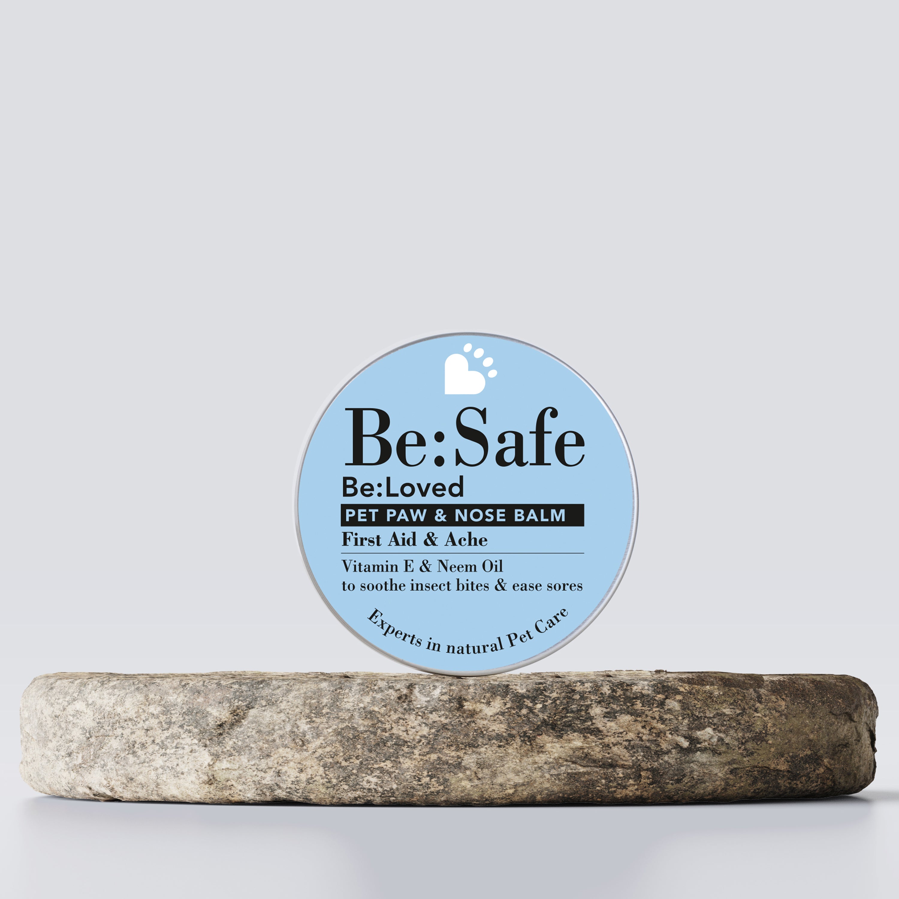 Be:safe pet paw and nose balm product on a wooden tray. 