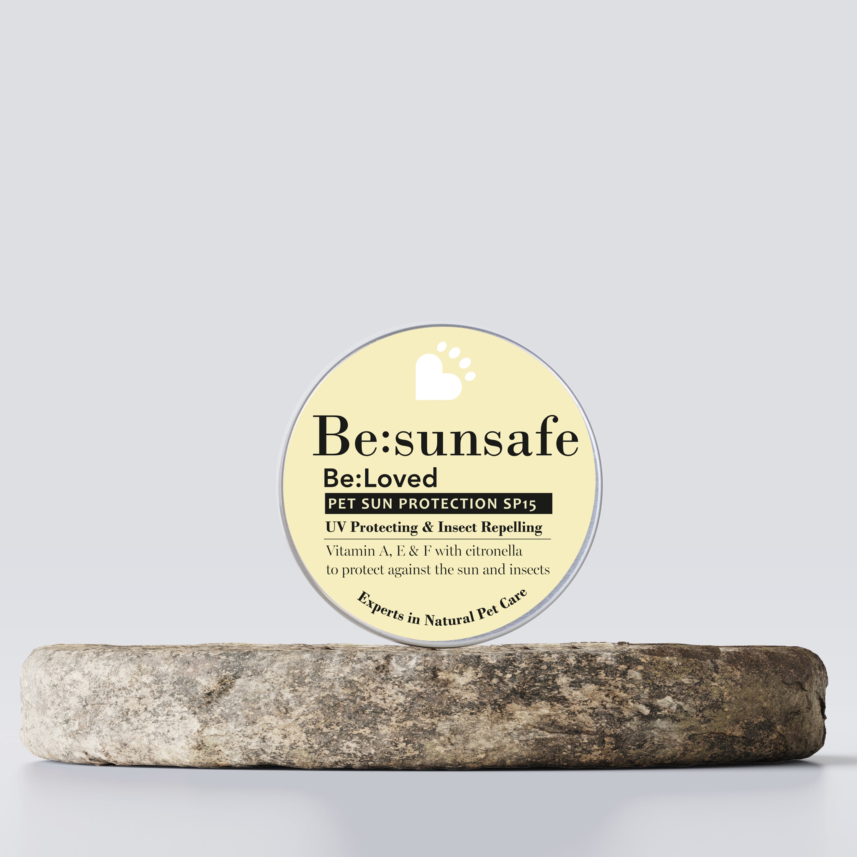 Be:sunsafe pet sun protection balm product on a wooden tray.